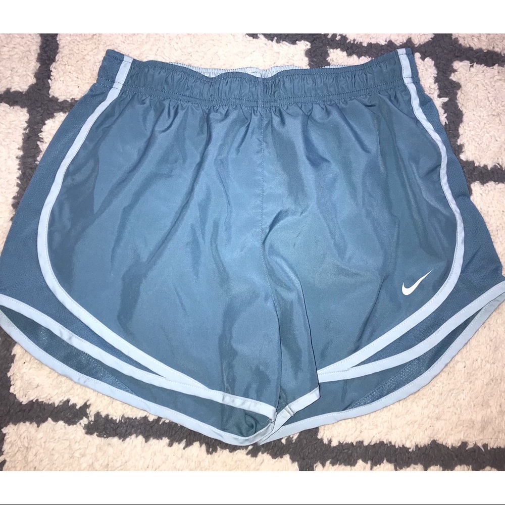 Blue Nike running shorts
